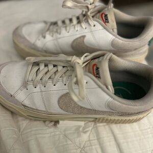 Nike women’s White and Tan Sneakers